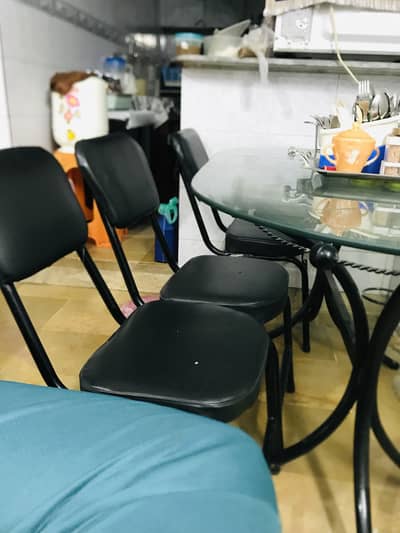 Glass dining table with 6 chairs