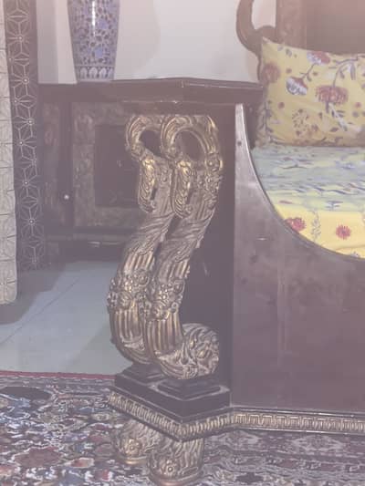 A beautiful king sized bed hand carved in very good condition