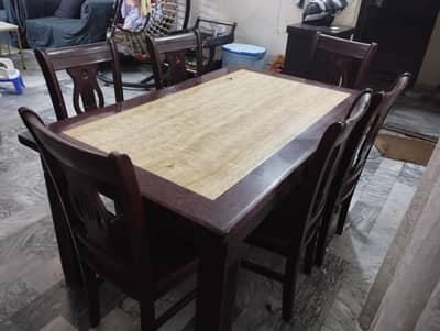 urgent sell of marble dining table with 6 wood chairs