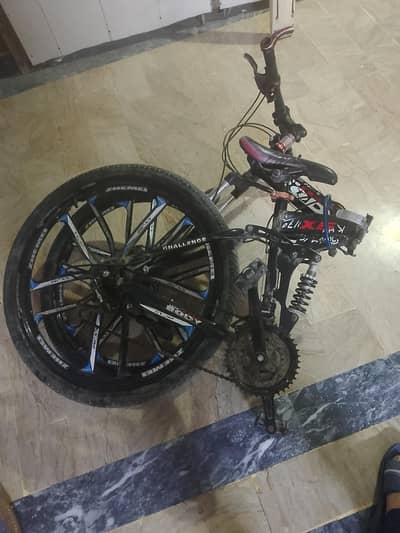 Folding bicycle with gear and disk brakes for sale