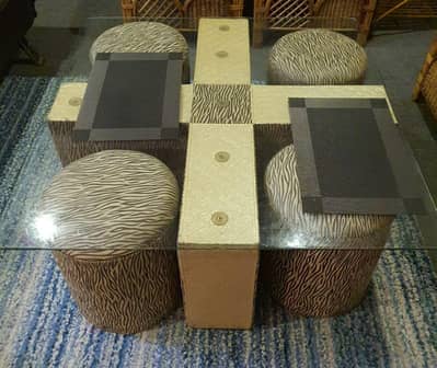 space-saving glass coffee table set with 4 matching ottoman seats