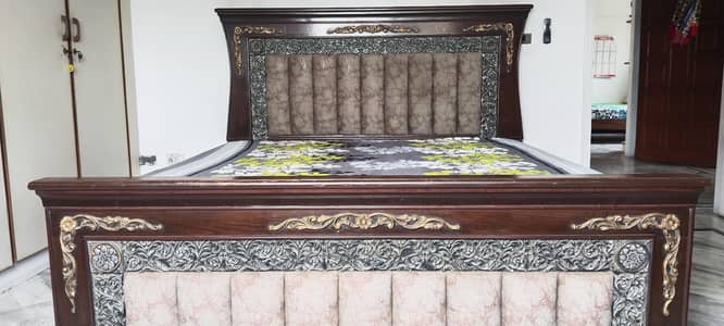 king size bed with 2 side tables and dressing table, frames and mirror