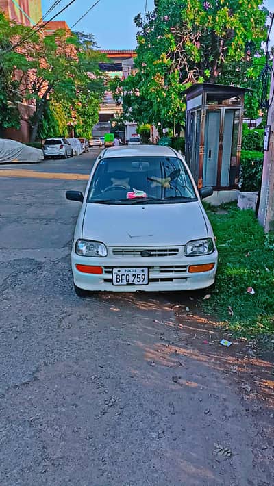 Daihatsu Cuore 2008 automatic transmission,AC,rims,cal 03396446665