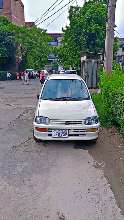 Daihatsu Cuore 2008 automatic transmission,AC,rims,cal 03396446665