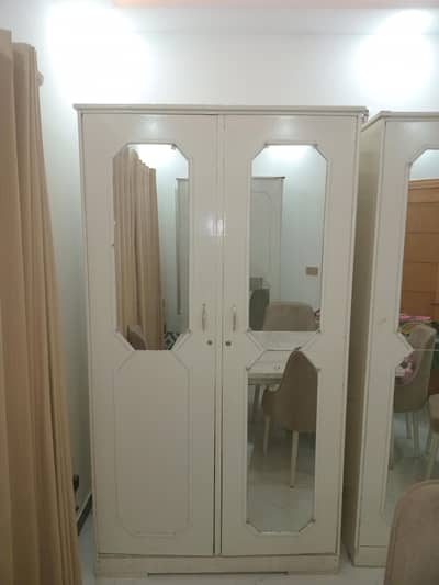 three wardrobes