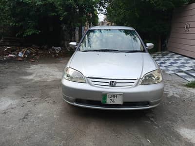 Honda civic EXI in original paint 2nd owner in lahore