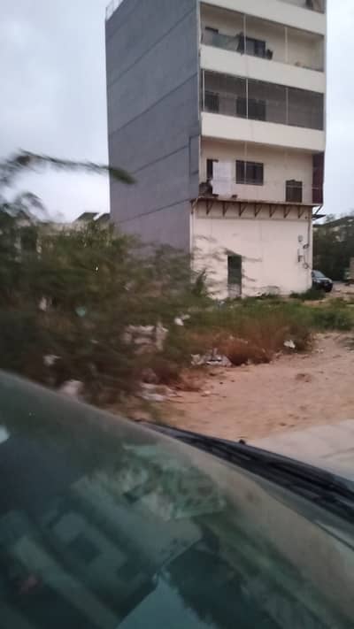 100 Sq. yards, Peninsula Commercial Plot on 60'ft wide road, West Open, Corner, 28th Street, Phase-8, DHA Karachi