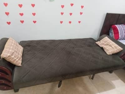 Three seater sofa cum bed