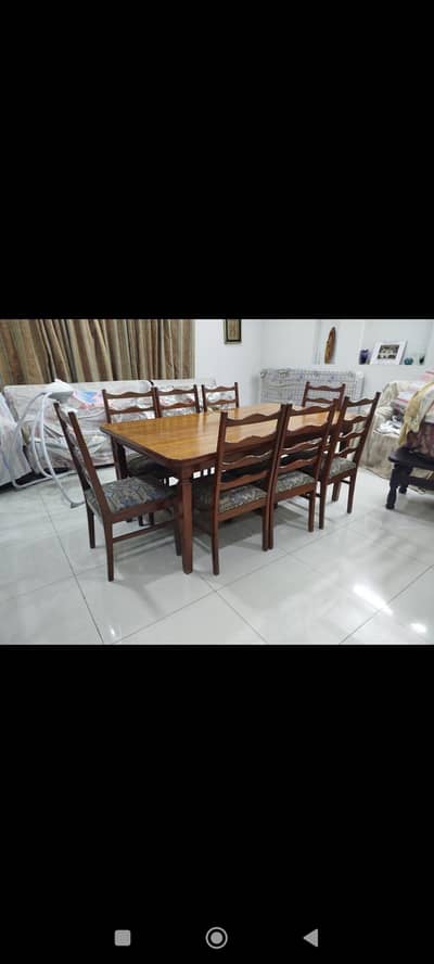 dinning table in a brand new condition with  8 chairs