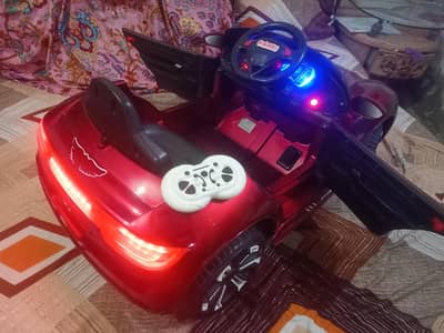kids imported car with Remote & swing jumping function ( shiny color)