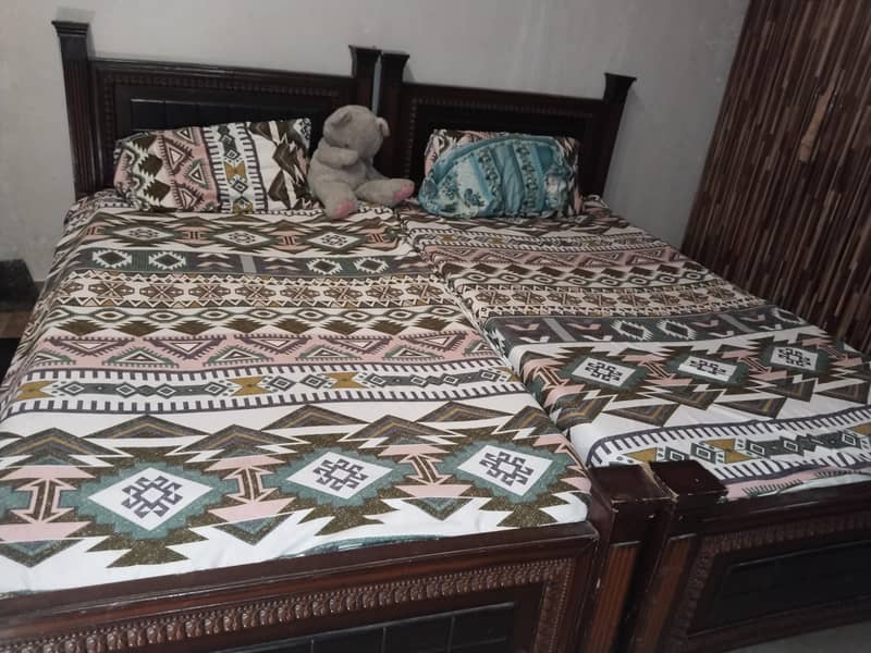 Two single bed without mattress 3