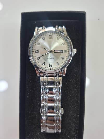Men's silver stainless steel quartz watch with day date