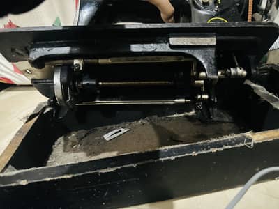 Sewing machine with speed control padel