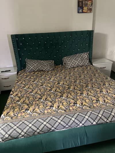 Bed , coffe chairs, dressing table with draws