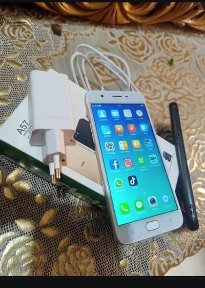 OPPO A57 with box charger final Hy price 4/64 saaf mobile