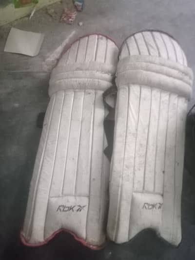 PADS AND HELMET + ELBOW GUARD