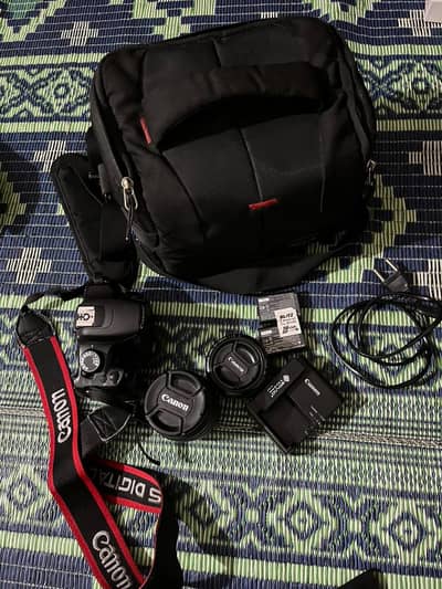 Canon EOS 1200D DSLR Camera with 2 Lenses + Bag + Accessories