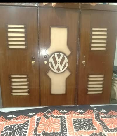 Wooden bed with mattress, wardrobe, side tables and dressingtable