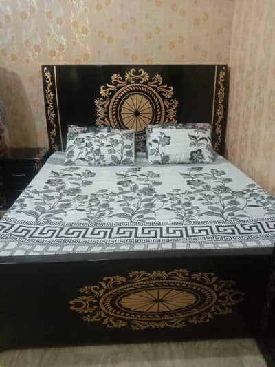 wooden bed and dressing table almost new