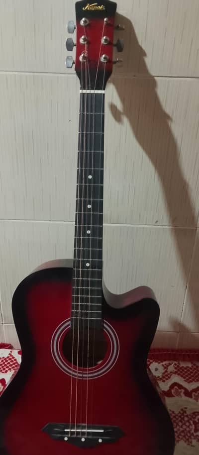 selling my 10 year old guitar 1 tar break