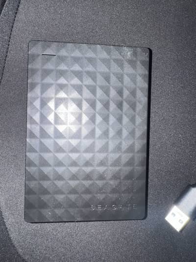 Seagate 1TB External Hard drive with enclosure cover