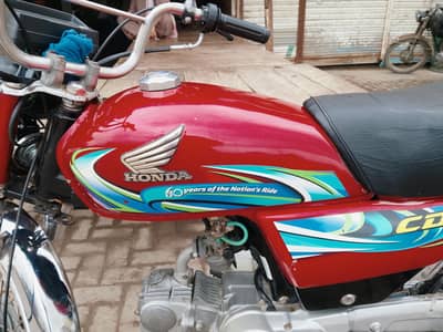 Honda CD 2025model red colour