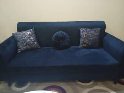 7 seater Sofa with White table and matching curtains
