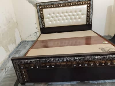 bed two said table with foom