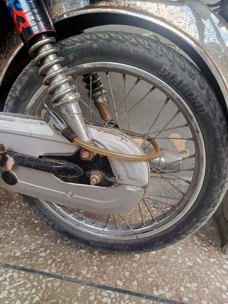United 70cc 5