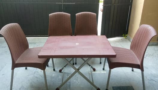 plastic chairs and table set