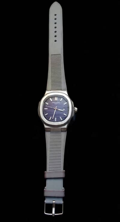 Premium  Blue  Dial  Watch  With  Gray  Strap - Used  - For  Sale