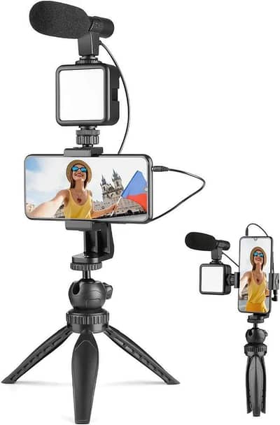 Black portable tripod stand with mic and light