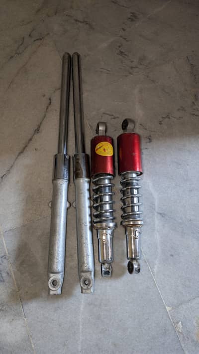 CD-70 front and back shock
