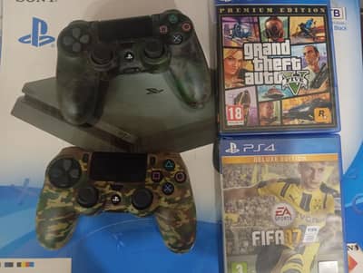 PS4 SLIM 1TB 2 controller with cover GTA v and FIFA 17 used like new