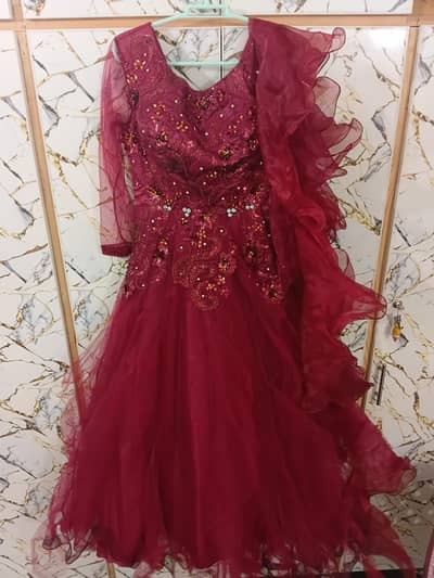 maroon color net maxi party wear