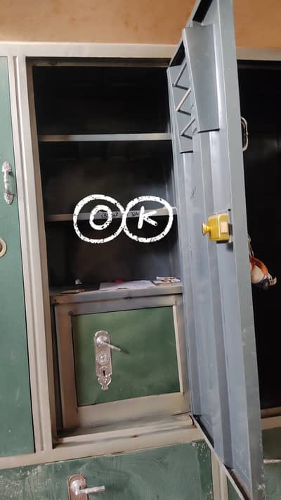 Triple door steel cupboard with locker inside