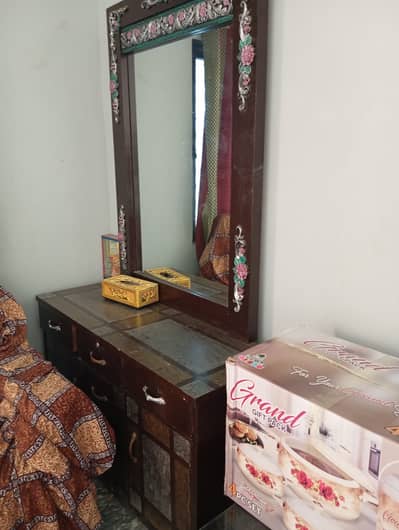 Bed Along with Dressing Table