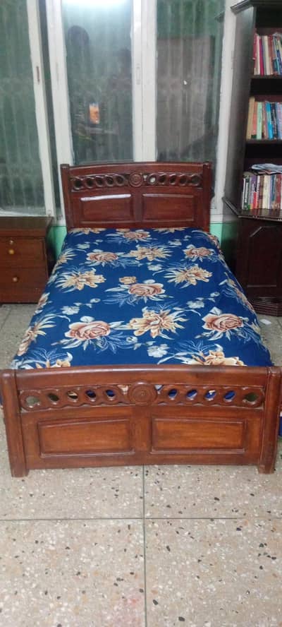 2 single wooden bed