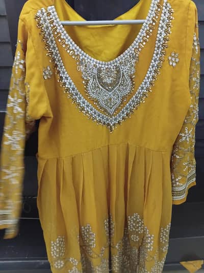 yellow party wear dress . medium. worm once . excellent condition