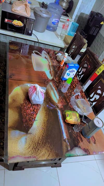 wooden 6 seat glass top dining table
