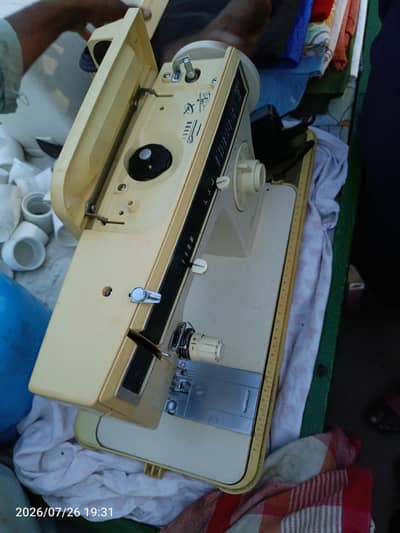 Singer machine
