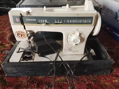 Singer sewing and Embroidery machine