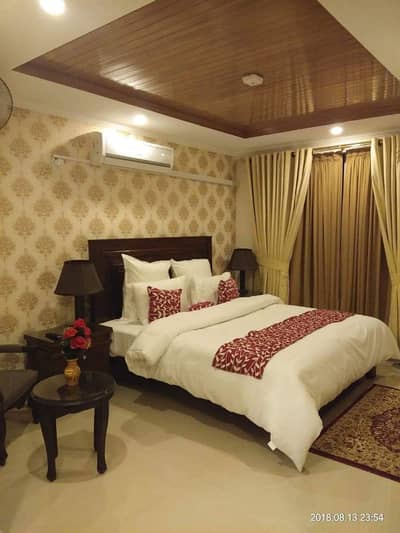 Par Day and short Time One and Two BeD Room appaertment Available Bahria Town Phase 4 and 6 Empire Heights 2 family apartment any time available