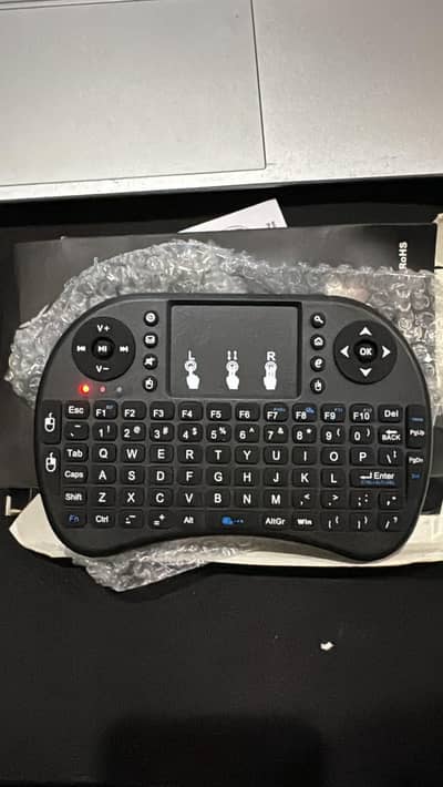 TV and Laptop keyboard with Mouse pad