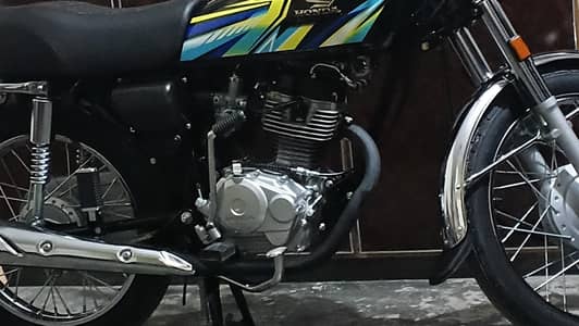 Honda CG 125 black color  first owner register all Punjab