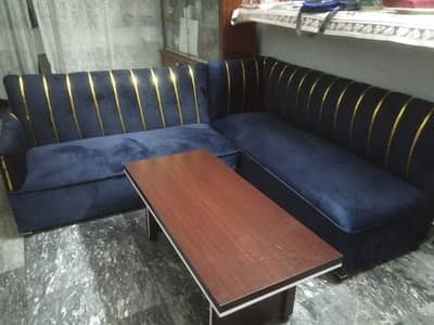 L shaped sofa set 6vseater neat condition and good rate