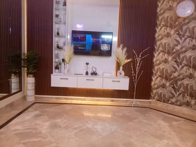 Fully reniveted apartment for sale 2 bed drawing dining 1050 sq feet badar commercial dha phase 5 Karachi