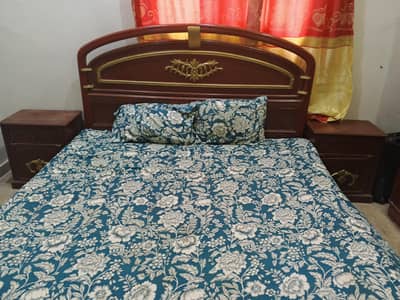 double bed with matterss with side table dressing table and alamari
