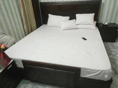 Double bed set , 2 side table, dressing and chairs for sale 120000
