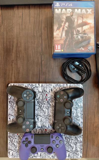 Playstation 4 Slim 1 TB with 3 controllers and 6 games